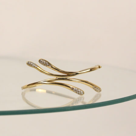 Bracelet manchette en 4 brins or 18 K et diamants