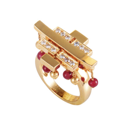 CARTIER - Bague à pompon Le Baiser du Dragon en or jaune partiellement serti de diamants avec des perles de rubis et d’or