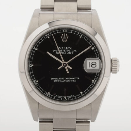 ROLEX - Datejust 31 mm, cadran noir à index bâtons et bracelet Oyster